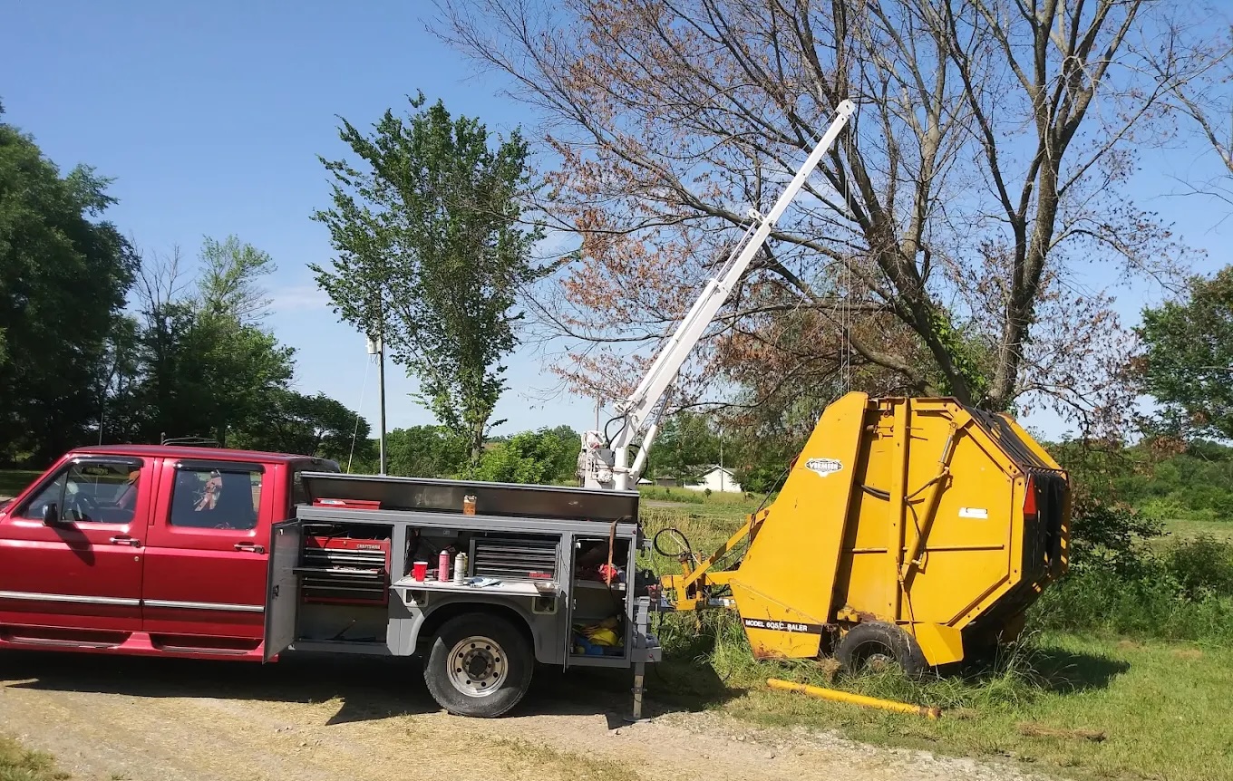 Red service truck on a construction site