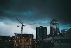 Close-up of heavy construction equipment being serviced