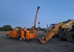 Technician performing structural welding and fabrication on equipment